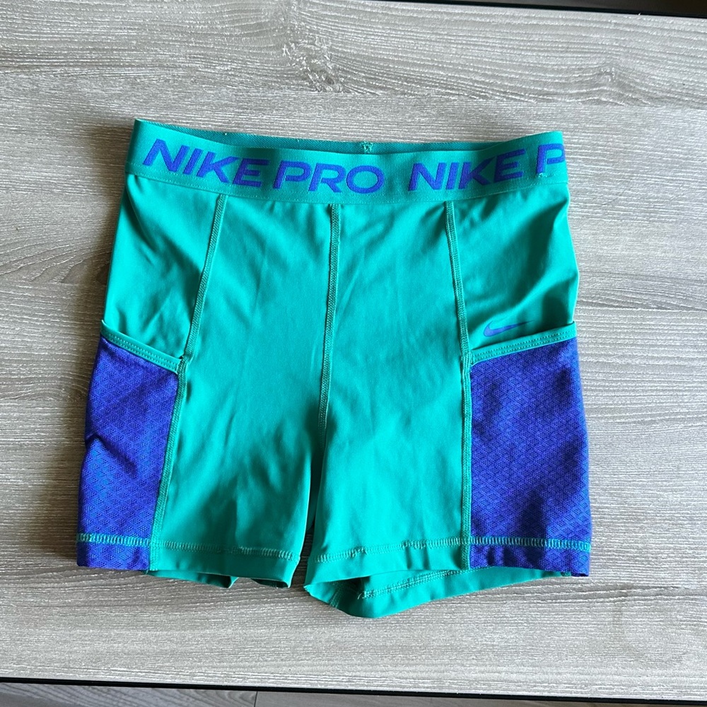 Teal & Purple Nike Pros